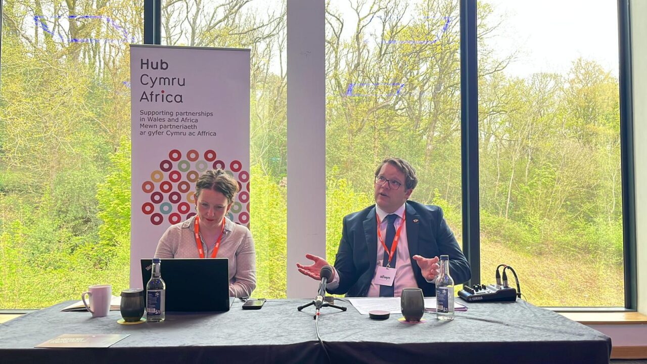 Claire O'Shea and Joel James MS on the panel at Hub Cymru Africa's fringe event