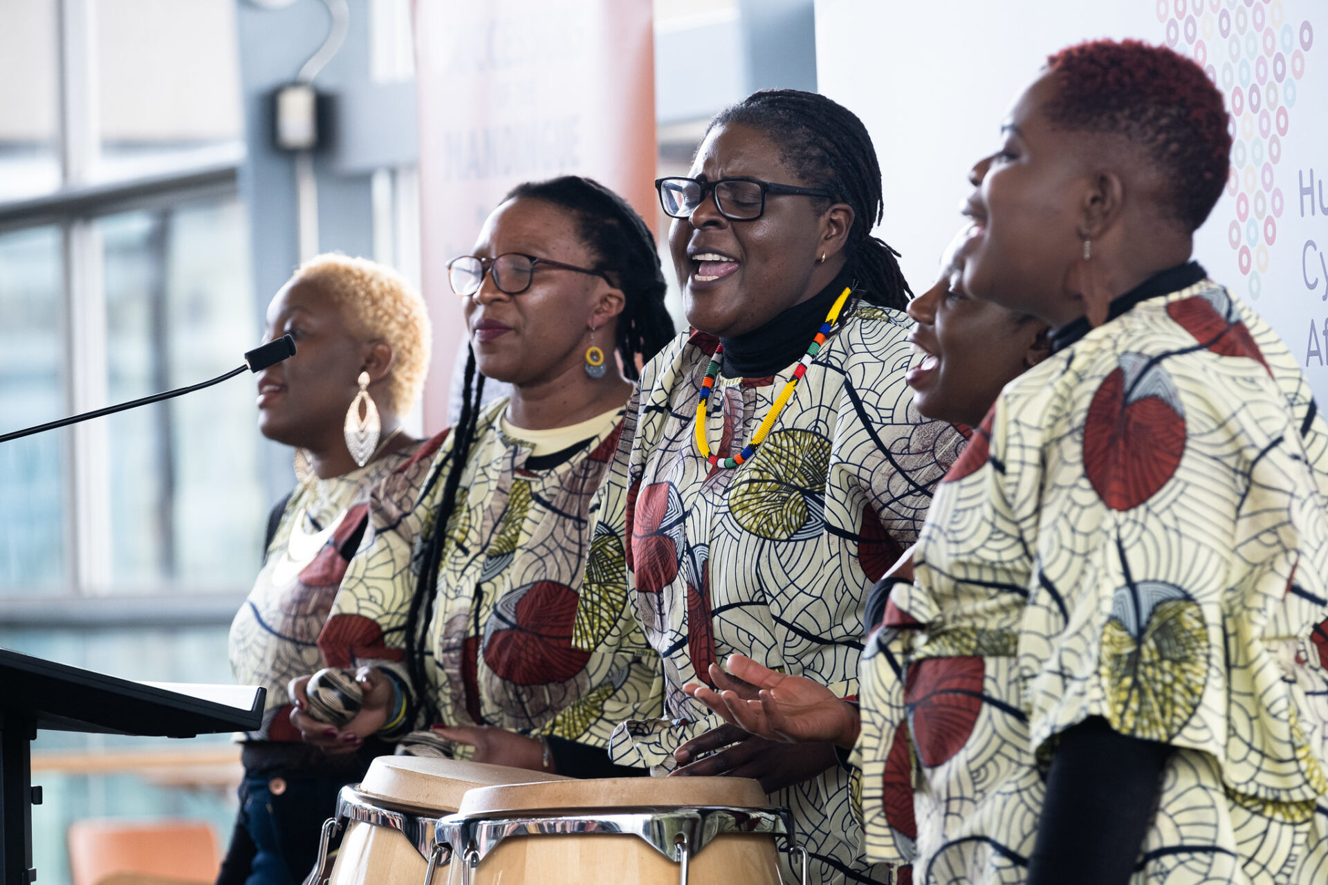 The ZimVoices Choir performing at an event in the Welsh Parliament.